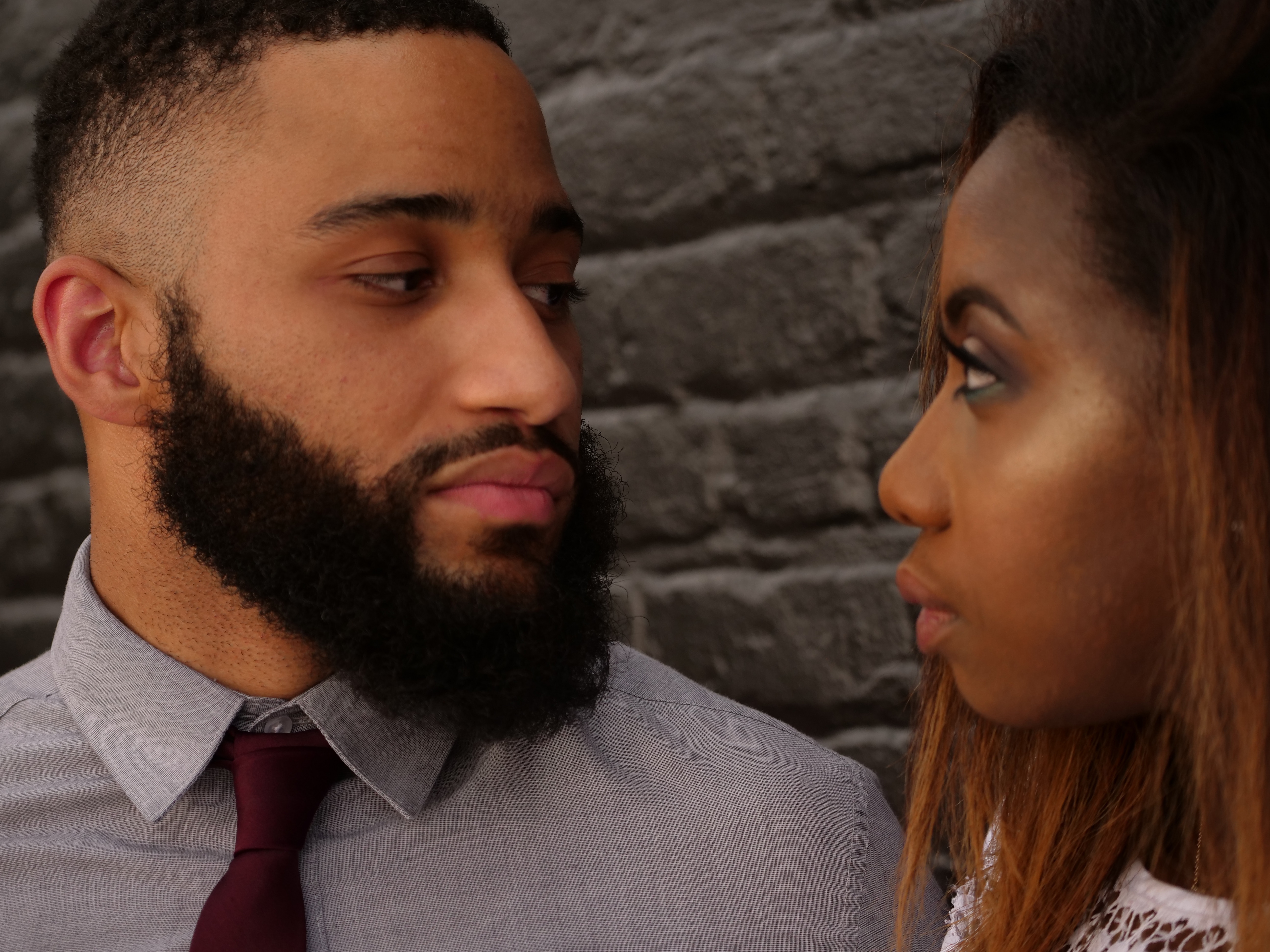 African American couple looking at each other