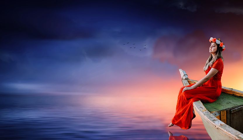 Woman with a flower crown sitting in a red dress on the prow of a boat on a purple ocean, wit distant black birds and clouds above her